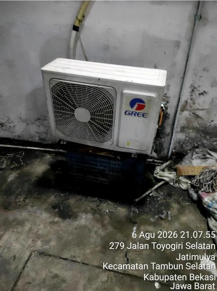Unit outdoor AC Gree 2 PK terpasang kembali dalam kondisi rapi setelah cuci besar dan perbaikan kebocoran freon selesai