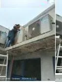 Unit outdoor AC Daikin terpasang di area rooftop cabang OLXmobbi Sungkono setelah instalasi selesai